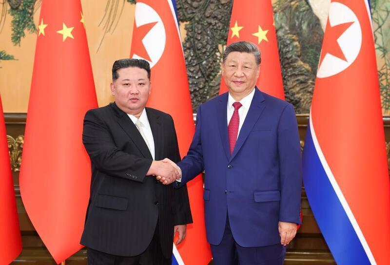 Chủ tịch Trung Quốc Tập Cận Bình và lãnh đạo Triều Tiên Kim Jong Un hội đàm tại Bắc Kinh. Ảnh: Tân Hoa Xã
