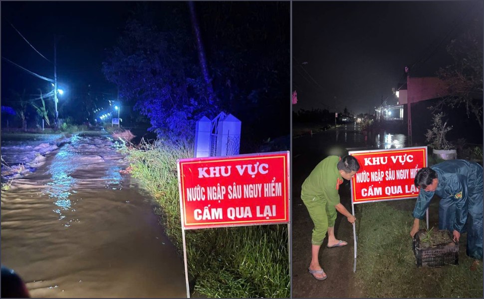Công an xã Phù Mỹ Đông cắm biển cảnh báo tại các đường tràn bị ngập nước. Ảnh: Công an