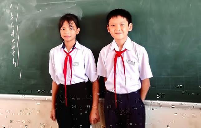 dong nai hai hoc sinh lop 5 nhat duoc hon 100 trieu dong tra lai nguoi danh roi
