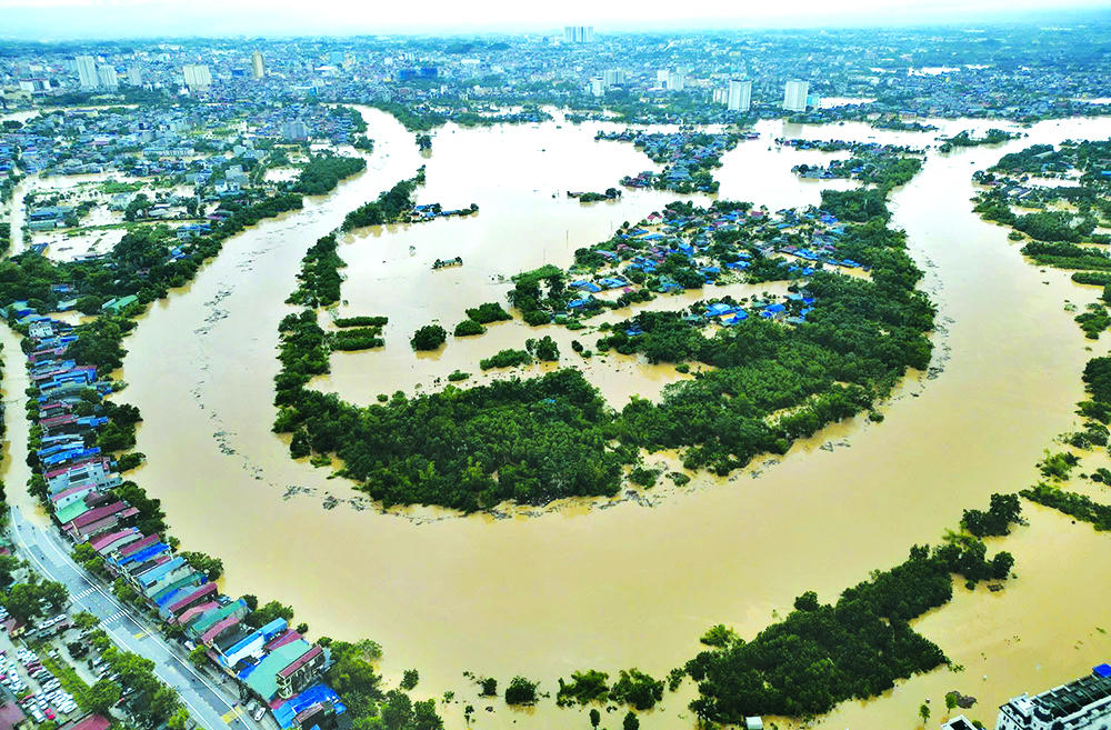 Lũ trên sông Cầu đoạn qua phường Linh Sơn lúc gần 16h ngày 7/10. (Ảnh: baothainguyen.vn)