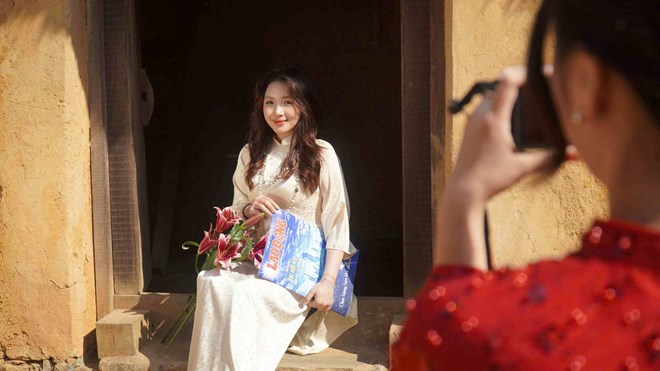 Trào lưu chụp ảnh áo dài Tết mang màu sắc văn hóa truyền thống